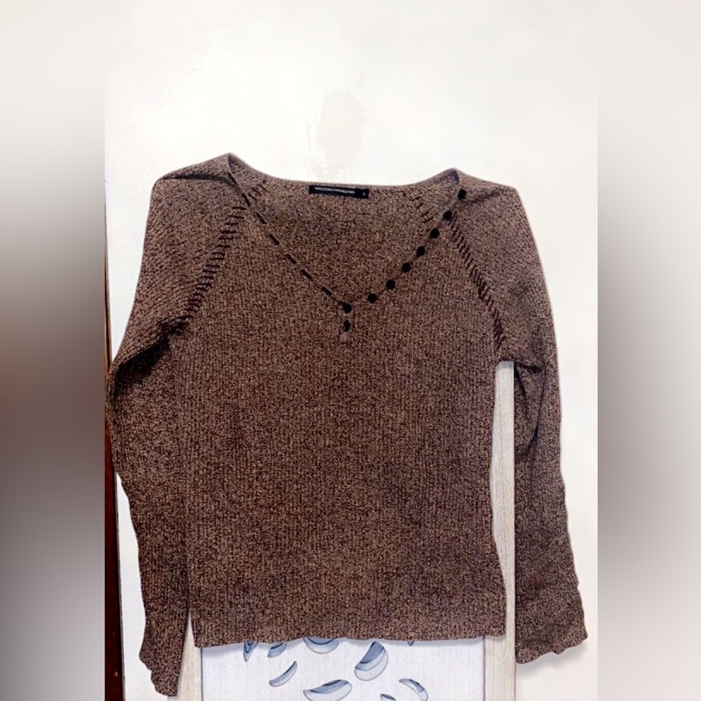 A long sleeve brown shirt acrylic style v- neck. Size: Large